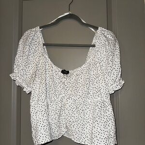 White blouse with black stars